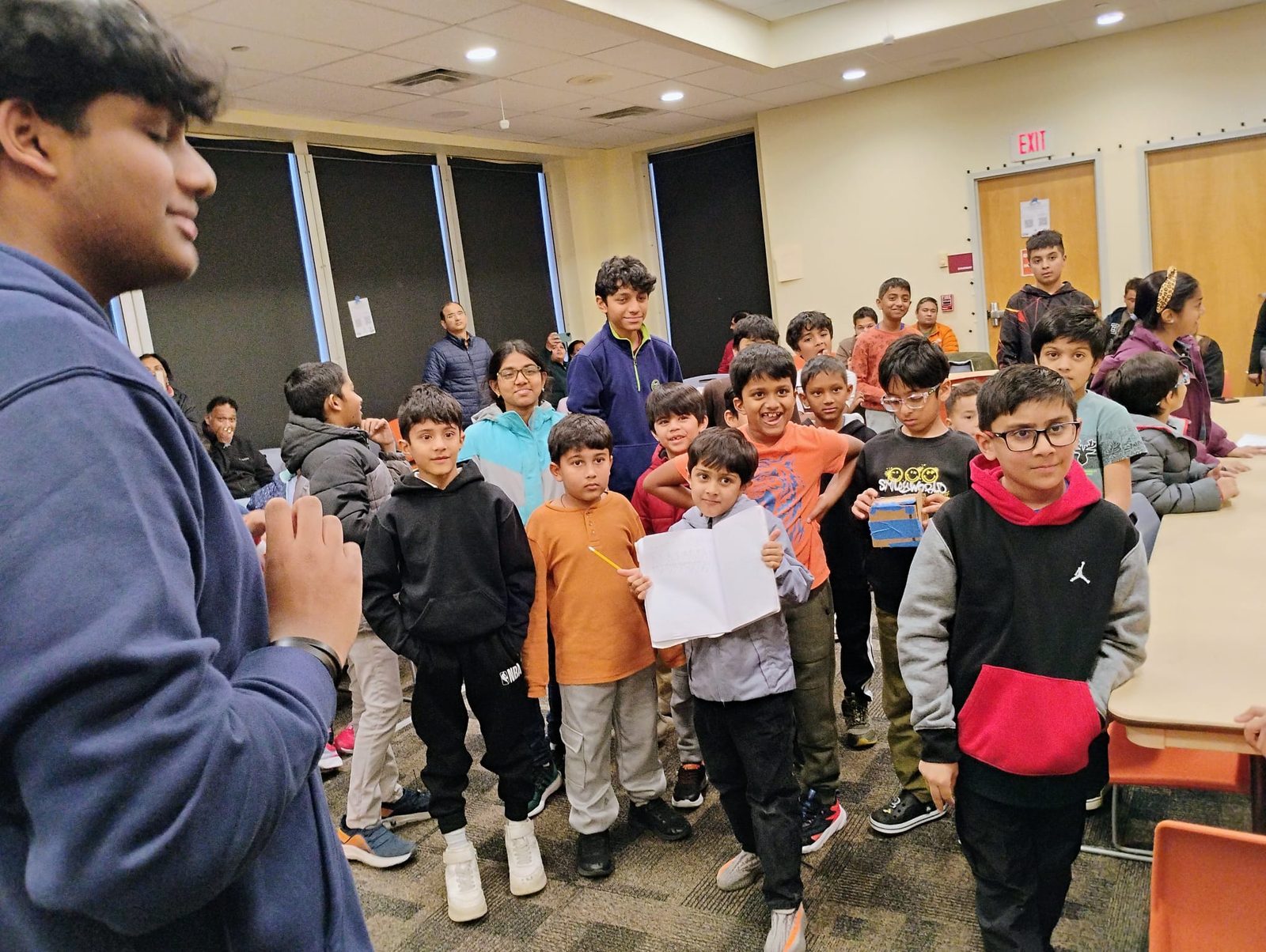 ElevateMinds student mentor with workshop participants